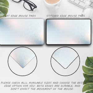 May include: Two rectangular mouse pads with a light blue and peach gradient background and a geometric pattern. One pad has a flat edge, the other has a stitched edge. Text reads "FLAT EDGE MOUSE PADS" and "STITCHED EDGE MOUSE PADS". Additional text advises checking sizes.