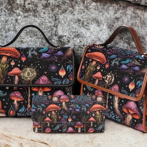 May include: Three black and brown handbags with a mushroom and floral print. The largest bag has a top handle and a flap closure. The medium bag has a top handle and a shoulder strap. The smallest bag is a clutch.