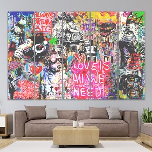 May include: A multi-panel canvas art print featuring a colourful graffiti-style design. The central panel displays the text "LOVE IS ALL WE NEED" in pink and red lettering. The other panels showcase various images and text, including a crown, a person with a camera, and the text "ALWAYS DREAM BIG".