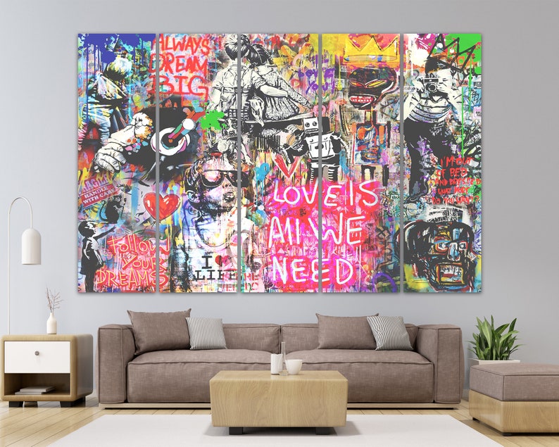 May include: A multi-panel canvas art print featuring a colourful graffiti-style design. The central panel displays the text "LOVE IS ALL WE NEED" in pink and red lettering. The other panels showcase various images and text, including a crown, a person with a camera, and the text "ALWAYS DREAM BIG".