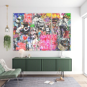 May include: A three-panel canvas print featuring a colourful, abstract graffiti style design. The artwork incorporates bold text, including "Love is All We Need", "Follow Your Dreams", and "Always Dream Big".