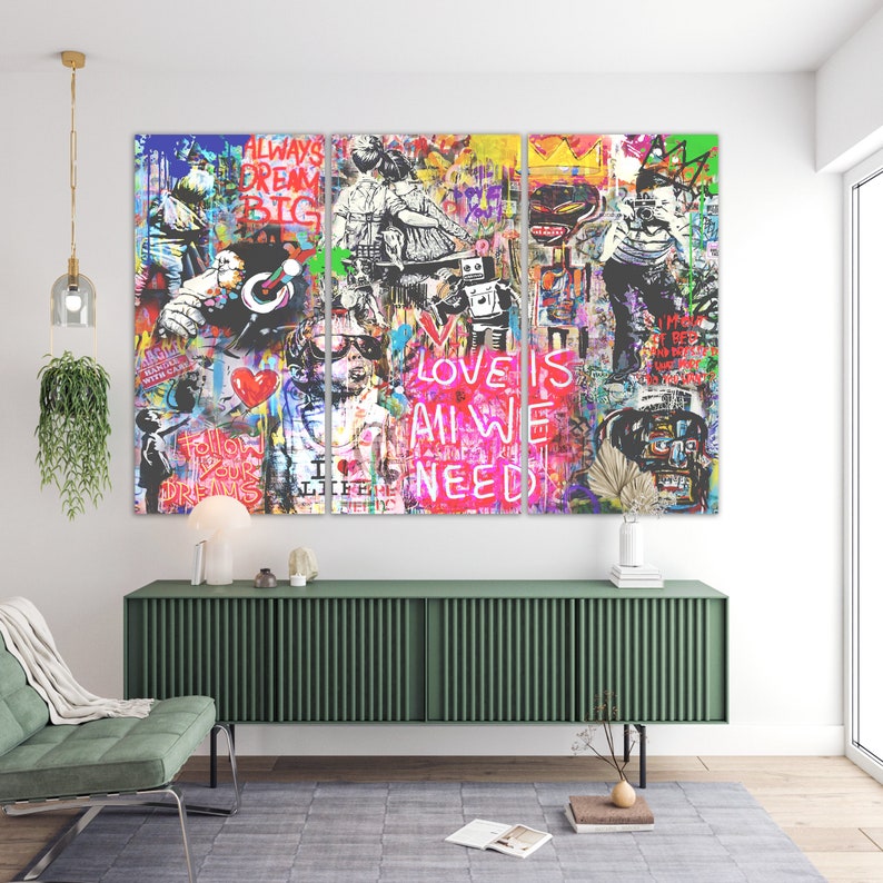 May include: A three-panel canvas print featuring a colourful, abstract graffiti style design. The artwork incorporates bold text, including "Love is All We Need", "Follow Your Dreams", and "Always Dream Big".