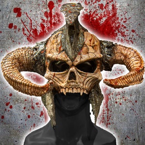 May include: A detailed, hand-painted skull mask with horns, featuring a textured, aged look and blood splatters. The mask is worn on a black mannequin head.