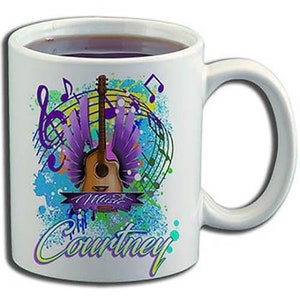 May include: White ceramic coffee mug with a colorful design featuring a guitar, musical notes, and the word "Music". The name "Courtney" is written in a colorful font at the bottom of the mug.