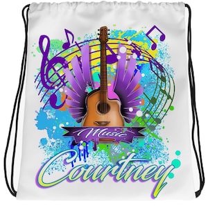 May include: White drawstring bag with a colorful design featuring a guitar, musical notes, and the words "Music" and "Courtney".
