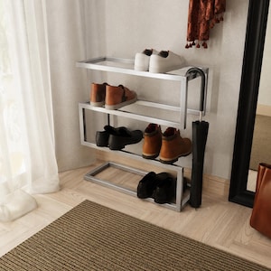 Modern metal freestanding shoe rack with umbrella holder, perfect for entryway or hallway organization.