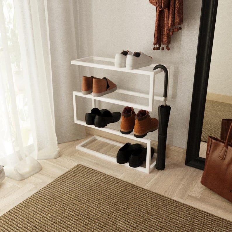 Multi-functional white shoe rack with an umbrella holder, a great housewarming gift for modern homes