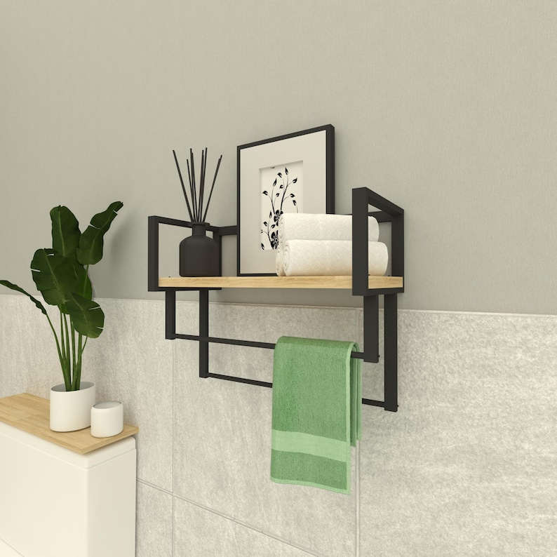 Industrial-style bathroom organizer with a towel holder, ideal for storing toiletries, decorative items, and hand towels
