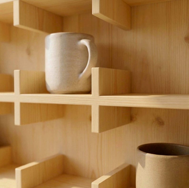 Coffee bar mug display shelf designed for organizing ceramic coffee cups