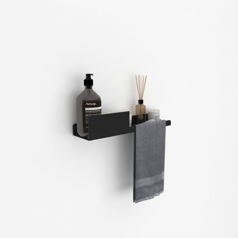 minimalist bathroom shelf with towel holder in modern bathroom