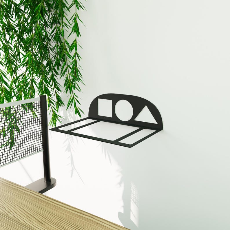 Stylish wall-mounted ping pong paddle and ball organizer, minimalist metal rack with Squid Game geometric design, great for modern home decor.