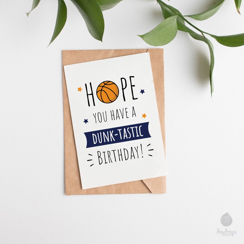 May include: A white card with a basketball graphic and the text "HOPE YOU HAVE A DUNK-TASTIC BIRTHDAY!"