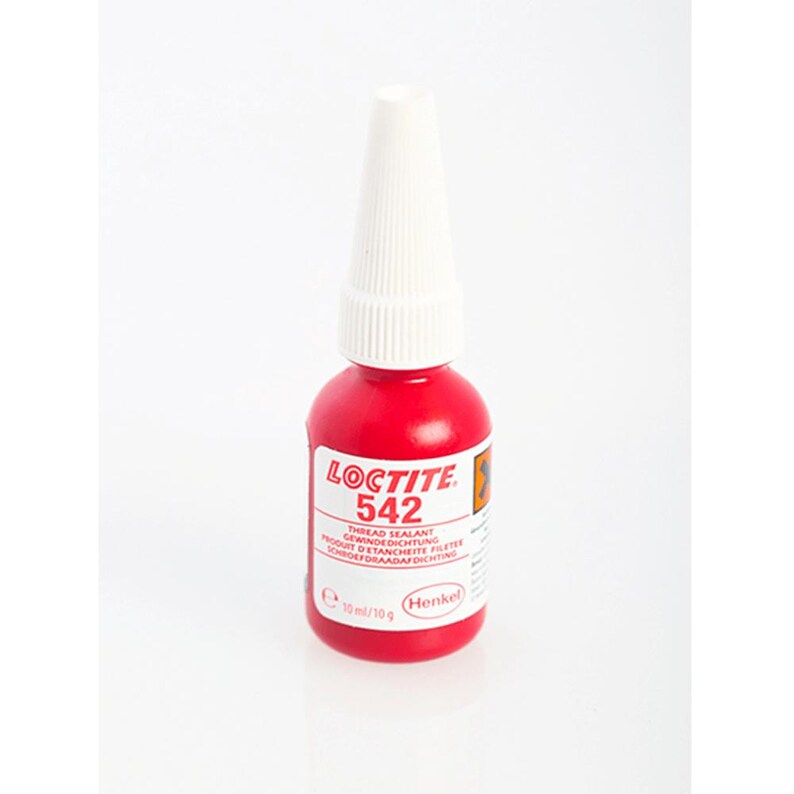 May include: A red bottle of Loctite 542 thread sealant. The bottle is labeled with the product name and instructions for use. The bottle is 10 ml/10g.