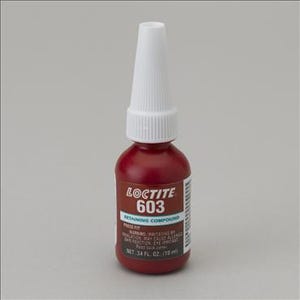 May include: A red bottle of Loctite 603 Retaining Compound. The bottle is labeled with the product name and warning information. It is a 3/4 fl oz (70 ml) bottle.