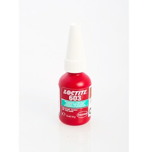 May include: A red bottle of Loctite 603 retaining compound. The bottle is labeled with the product name and a description of its use. The bottle is 10 ml/10 g.