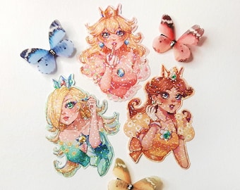 May include: Four princess characters with glitter accents and butterfly stickers. The princesses are wearing crowns and dresses with glitter accents. The butterflies are blue, pink, and yellow.