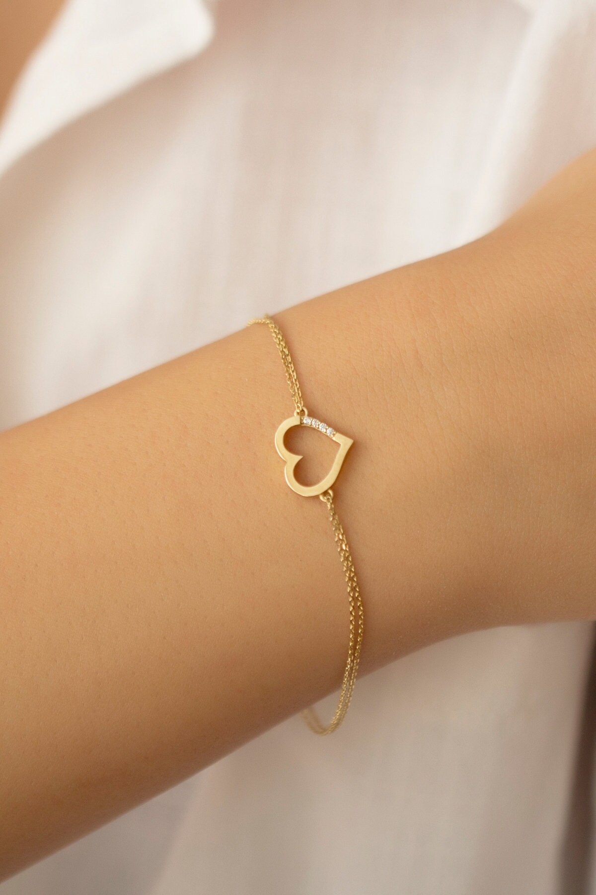 Showroom of 18k rose gold heart shape bracelet  Jewelxy  218321