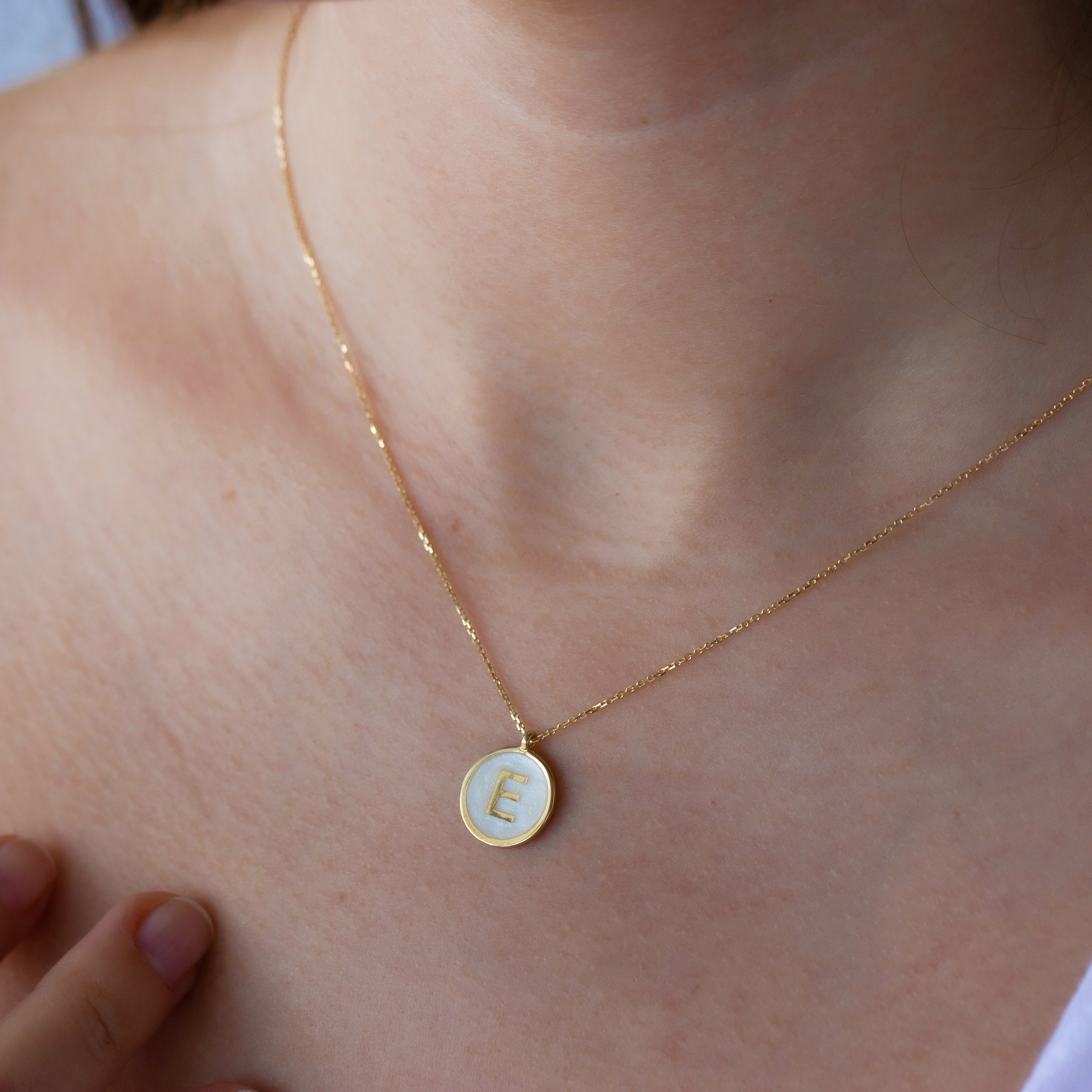 Letter E necklace in 14k gold