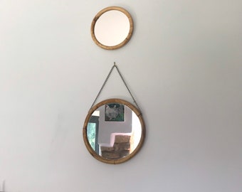 Two round Mid century boho tiki bamboo mirrors