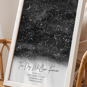 May include: A framed vertical print featuring a black and white star map of the night sky. The text reads The Day We Chose Forever, Salt Lake City, UT, September 24, 2025, and coordinates. The print is housed in a simple white frame with a glass front.