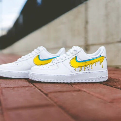 Nike air force outlet one yellow swoosh