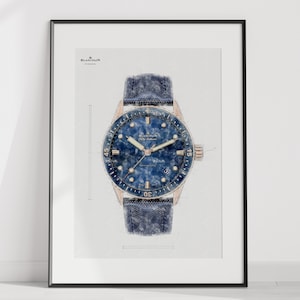 Peut inclure: Une montre bleue et or rose avec un cadran bleu et un bracelet en toile bleu. Le cadran de la montre a un guichet de date à 3 heures et le texte "Blancpain" imprimé dessus.