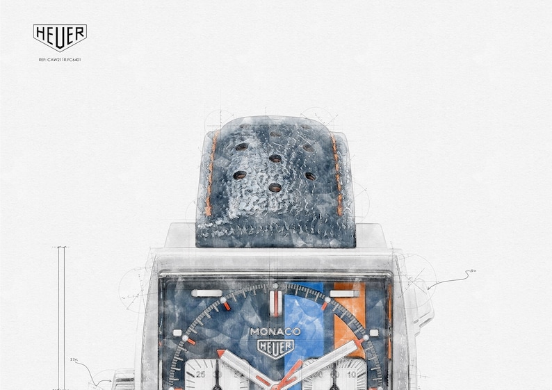 Peut inclure: Une montre chronographe argent&eacute;e et bleue avec un cadran carr&eacute;. La montre a un cadran bleu et orange avec le texte "MONACO HEUER" dessus. La montre est sur un bracelet en cuir bleu avec des coutures.