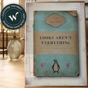 Puede incluir: Una portada de libro vintage con fondo azul y el título "Looks Aren't Everything" en texto blanco. El subtítulo es "But I've Got Them Just In Case". Una ilustración de pingüino se encuentra debajo del texto. La portada también incluye las palabras "Non Fiction" y "6d net" en rosa.