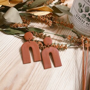 polymer arch earring