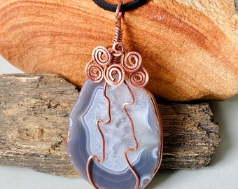 Large Hand Polished Arizona gray banded Agate with clear crystal center Rose design Copper Wire Wrapped Pendant on faux leather Necklace.