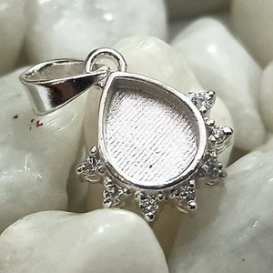 The 7Cz Teardrop Pendant with 6x8mm Blank Bezel, 925 Sterling Silver Pendant. Good for resin and ashes work. Any color zircon available.