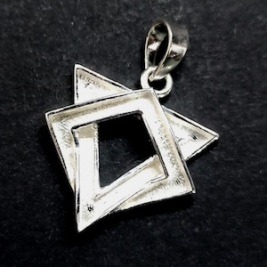 May include: Silver pendant in the shape of a Star of David, with a square design in the center.