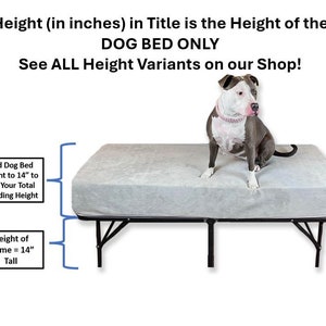 May include: A gray dog bed frame with a gray fabric mattress. The frame is 14 inches tall and can be adjusted to a total height of 14 inches by adding a dog bed. The text "Height (in inches) in Title is the Height of the DOG BED ONLY See ALL Height Variants on our Shop!" is displayed above the bed.