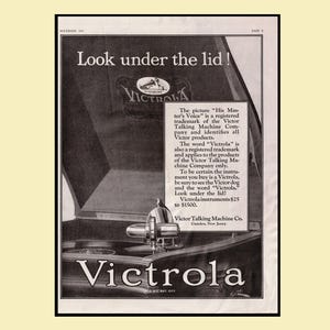 May include: Vintage advertisement for a Victrola record player. The image features the Victrola logo and the text "Look under the lid!" The advertisement also includes text describing the Victrola brand and its features.