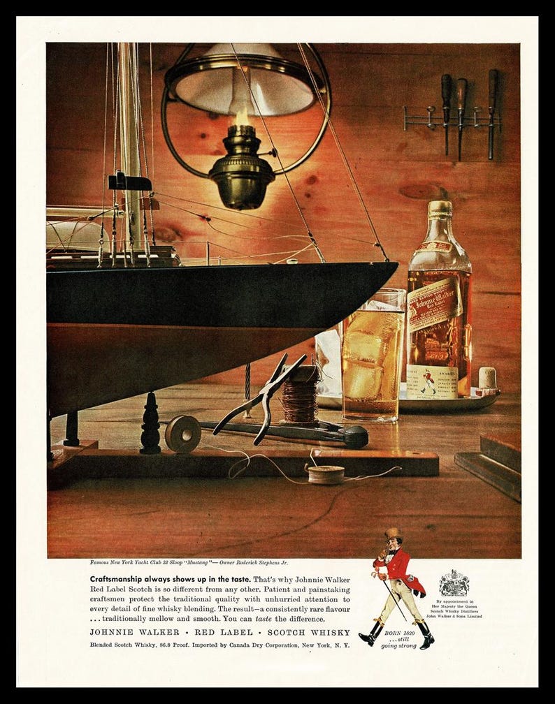 May include: A vintage advertisement for Johnnie Walker Red Label Scotch Whisky. The ad features a still life of a bottle of scotch, a glass of ice, and a model sailboat on a wooden table. The text reads "Craftsmanship always shows up in the taste. That's why Johnnie Walker Red Label Scotch is so different from any other. Patient and painstaking craftsmen protect the traditional quality with unhurried attention to every detail of fine whisky blending. The result - a consistently rare flavour ... traditionally mellow and smooth. You can taste the difference. Johnnie Walker Red Label Scotch Whisky. Blended Scotch Whisky, 86.8 Proof. Imported by Canada Dry Corporation, New York, N.Y."
