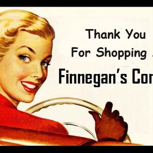 May include: A woman with blonde hair is driving a car. The text on the image says "Thank You For Shopping At Finnegan's Corner."