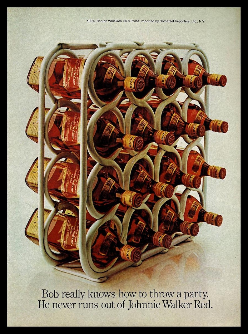 May include: A metal wire rack filled with bottles of Johnnie Walker Red Label Scotch whisky. The bottles are arranged in rows and are all facing the same direction. The rack is sitting on a white surface. The text "100% Scotch Whiskies. 86.8 Proof. Imported by Somerset Importers, Ltd., N.Y." is printed at the top of the image. The text "Bob really knows how to throw a party. He never runs out of Johnnie Walker Red." is printed at the bottom of the image.