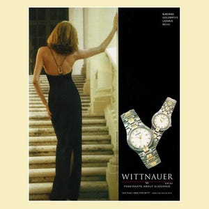 May include: An advertisement featuring a woman in a black dress ascending a staircase. Two Wittnauer watches with silver and gold bands are displayed against a black background. The text "WITTNAUER" and "PASSIONATE ABOUT ELEGANCE" are visible.