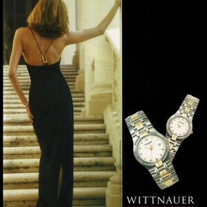 May include: A woman in a black evening gown stands on a stone staircase. The dress has a low back with a gold-colored accent. Two Wittnauer Swiss watches with silver and gold bands are displayed. Text reads "WITTNAUER SWISS PASSIONATE ABOUT ELEGANCE."