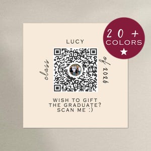 May include: A graduation-themed design on a beige background. The design includes a QR code with a photo in the center, the name "LUCY", and the text "class of 2026". A burgundy circle with the text "20+ COLORS" is also present. The text "WISH TO GIFT THE GRADUATE? SCAN ME :)" is included.