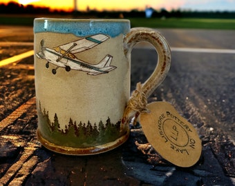Cessna 172 Handmade over the Evergreens Pottery Mug