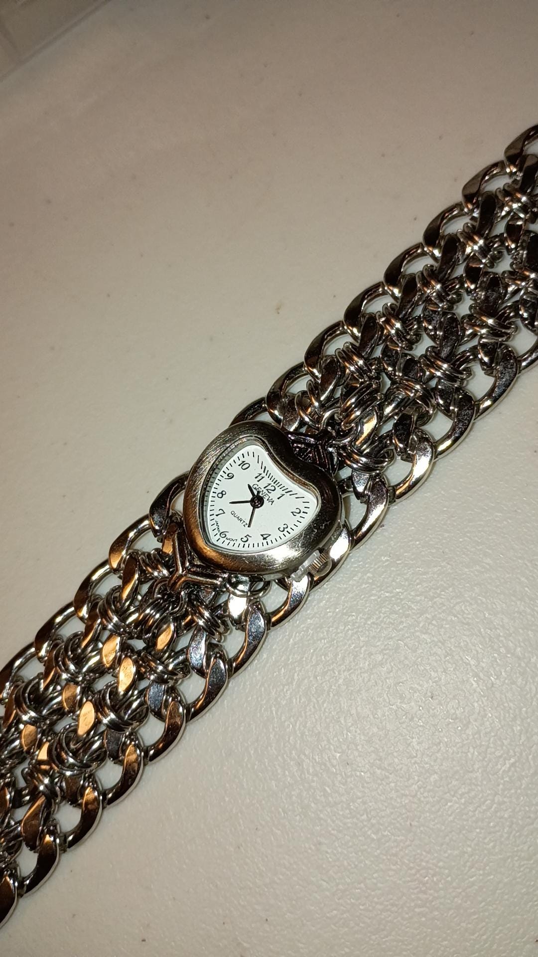 Lost Time is Never Found. Heart Watch Face on Stainless Steel Chain ...