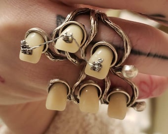 Trio Teeth ring. Available with/ without braces! Gem cavities also available.
