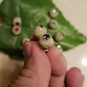 2 pair!! 4 earrings. Gem cavity molar earrings. Standard post. Gold option available. Shipping covered!