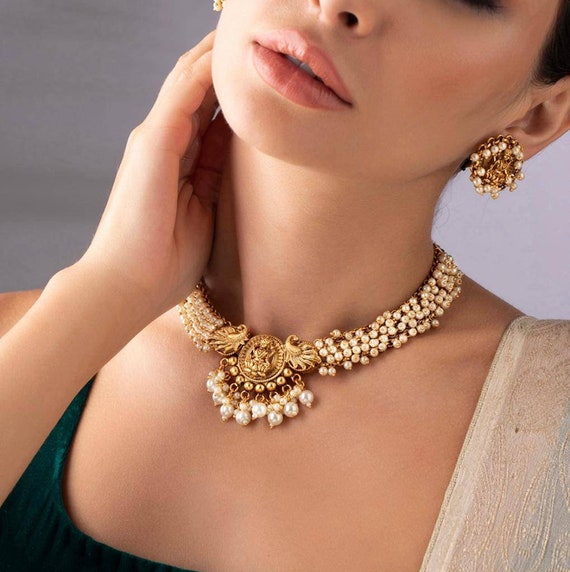 Gold set with white on sale pearls