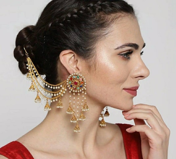 Jhumka in ear deals