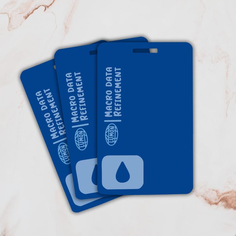 May include: Three blue plastic cards with the text "Macro Data Refinement" and a blue water drop logo. The cards have a hole in the top corner for hanging.