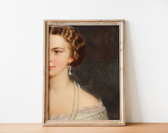 May include: A framed portrait painting of a woman with brown hair, wearing a white lace dress and pearl necklace. The painting is set against a dark background.