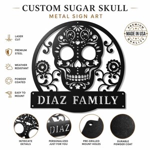 May include: Black metal sign featuring a sugar skull design with floral accents, the text "DIAZ FAMILY", and the words "CUSTOM SUGAR SKULL METAL SIGN ART". The sign is laser cut, powder coated, and weather resistant.