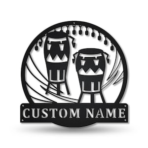 May include: Black metal wall art featuring two conga drums with a decorative swirl design and the text "CUSTOM NAME".